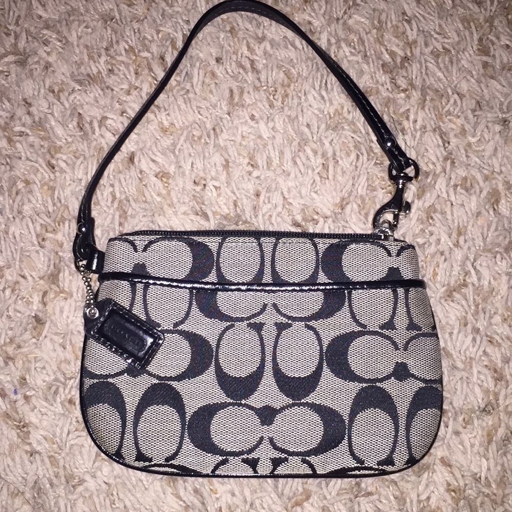 Small coach wristlet. Never used